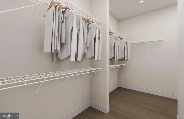 a bathroom with a shower sink and mirror