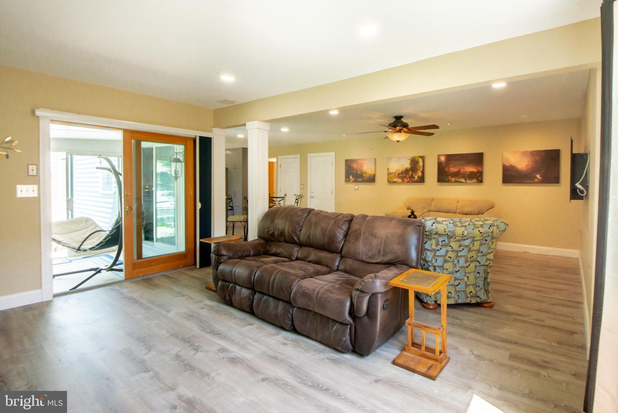 2919 Cub Hill Road Baltimore, MD 21234 - Photo 13 of 46 main level FR open to sun porch