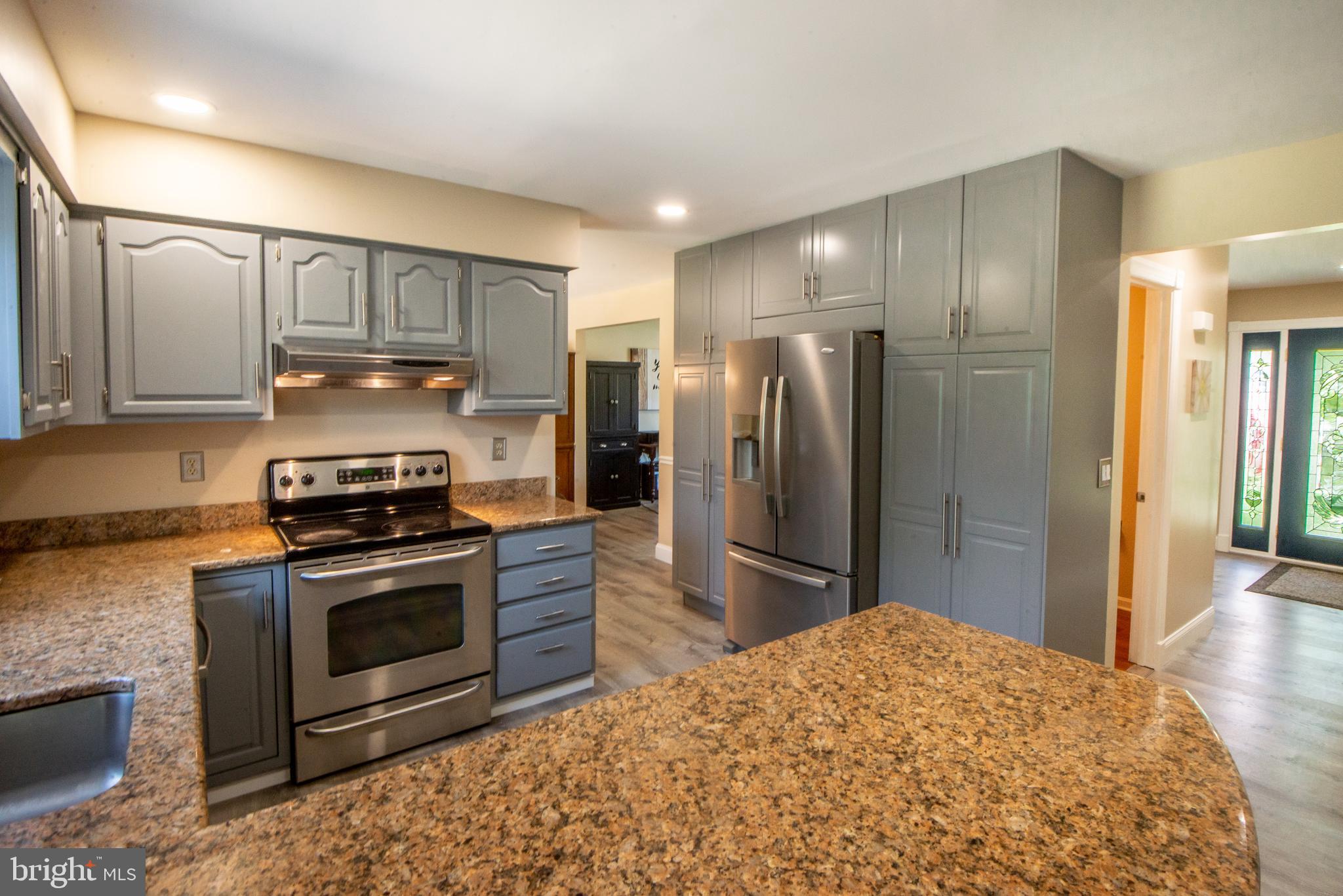 Updated Kitchen with granite and SS Appliances