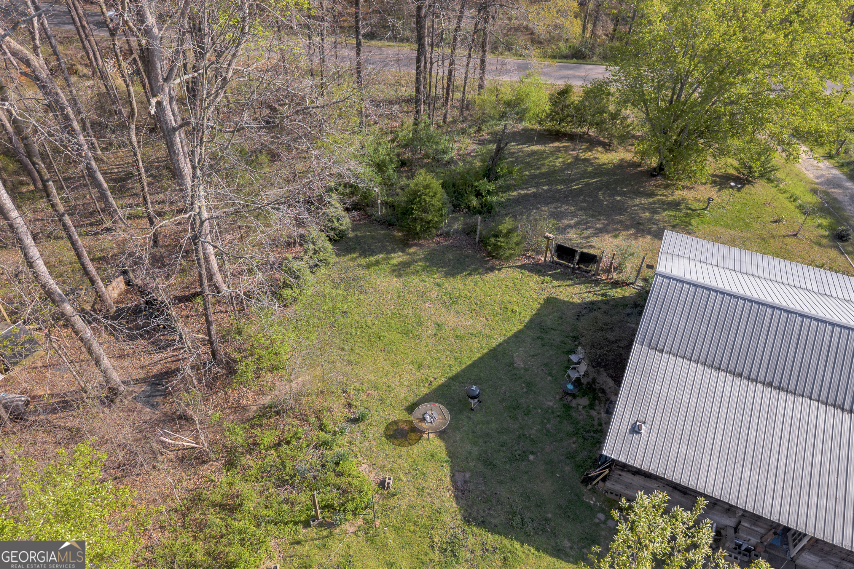 1413 Whiting Road Lavonia, GA 30553 - Photo 7 of 74 A mix of cleared space and wooded privacy, offering flexibility for a future homesite or retreat.