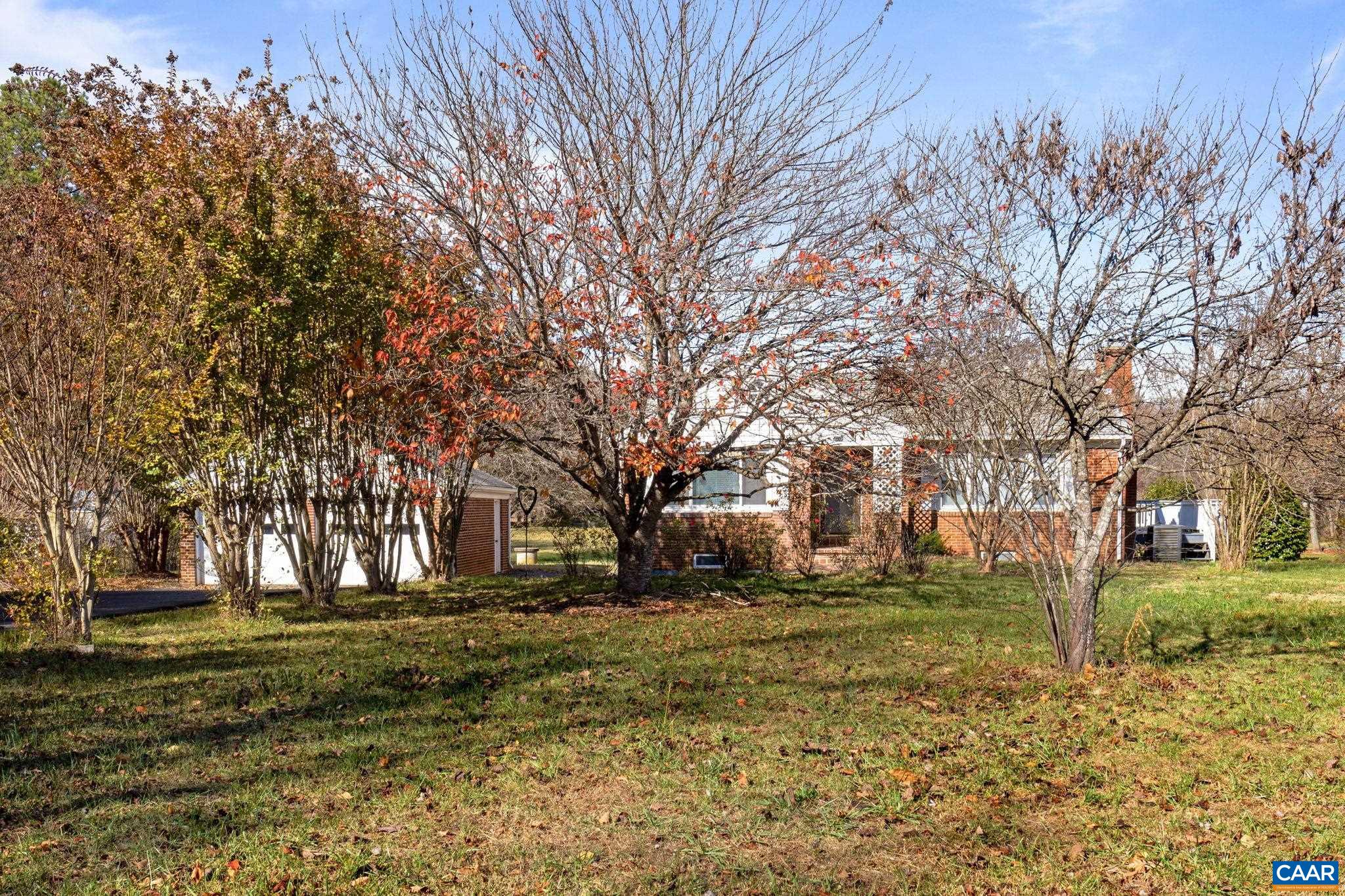 855 Moore Road Ruckersville, VA 22968 - Photo 36 of 39 a front view of a building with trees