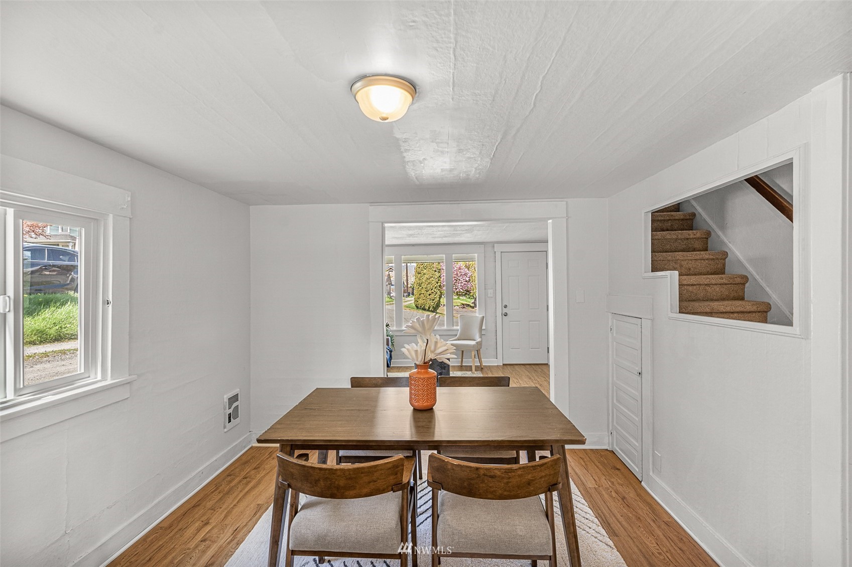 2228 Main Street Everett, WA 98203 - Photo 12 of 29 a view of a dining room with furniture and wooden floor