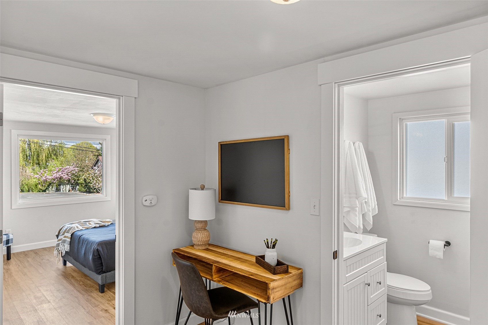 2228 Main Street Everett, WA 98203 - Photo 13 of 29 a bathroom with a toilet a sink and a mirror