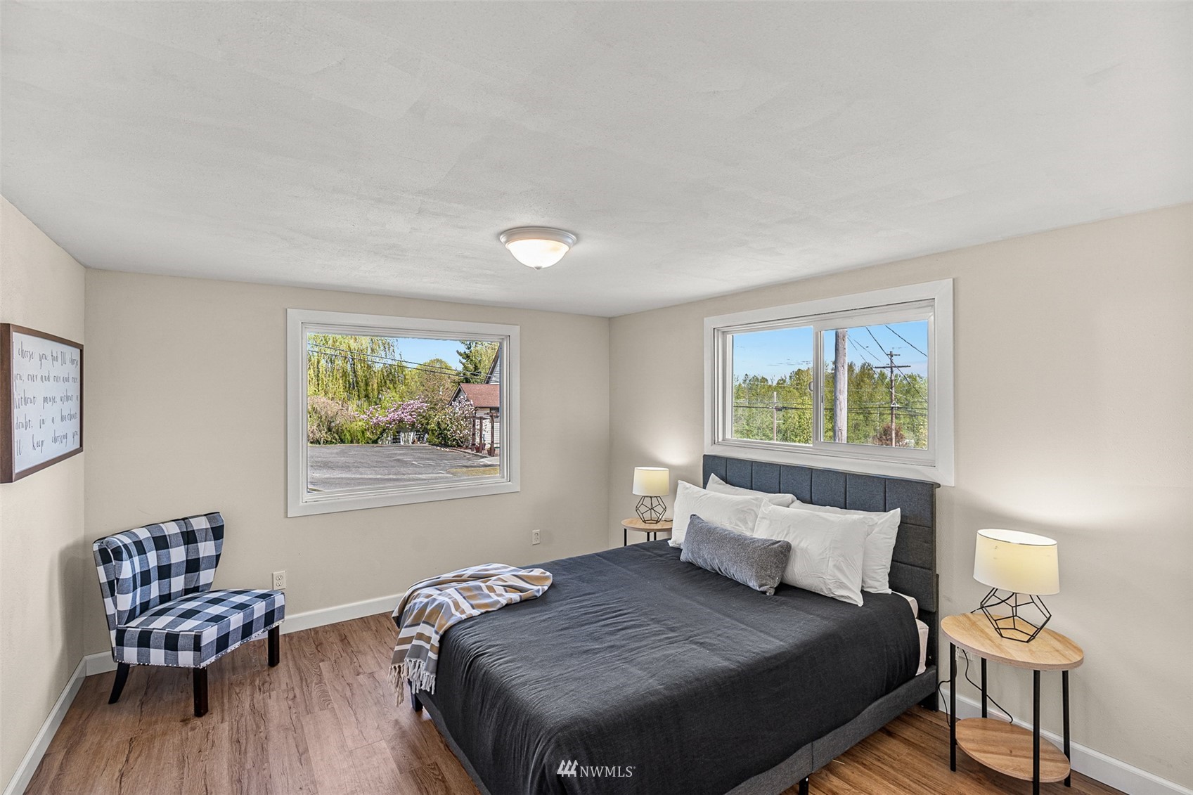 2228 Main Street Everett, WA 98203 - Photo 16 of 29 a bedroom with a bed and a chair