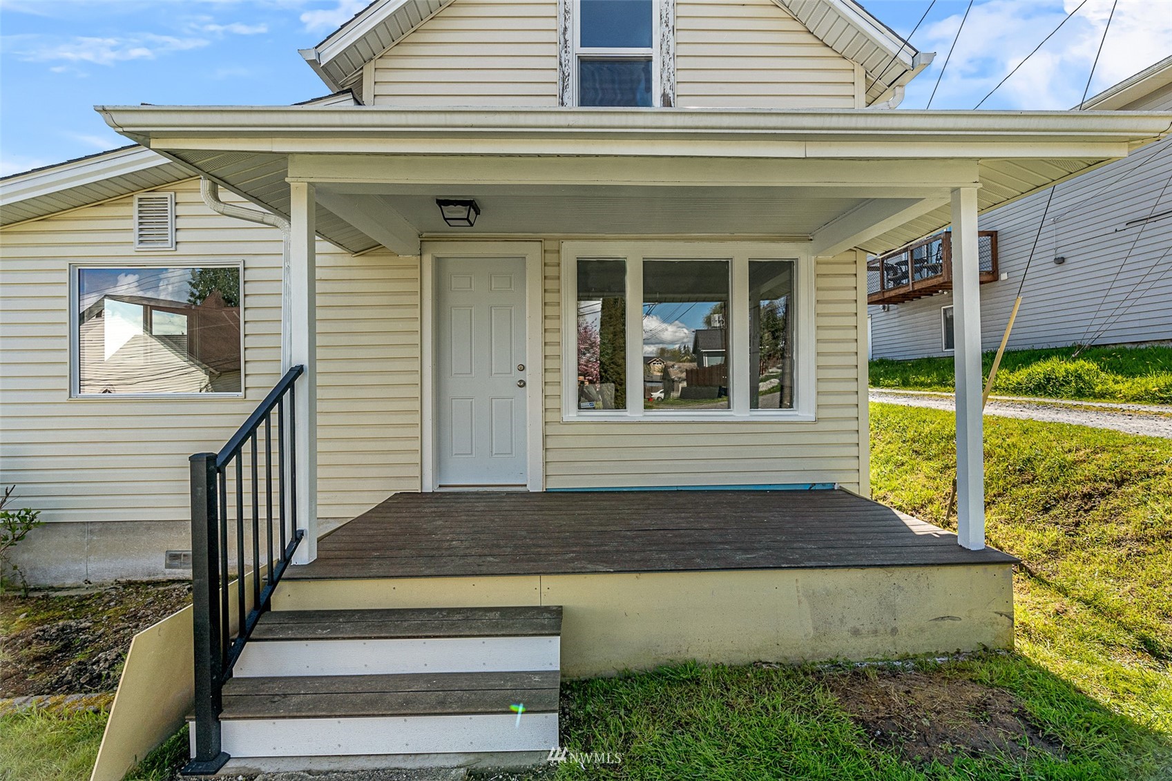 2228 Main Street Everett, WA 98203 - Photo 3 of 29 a view of a house with porch and wooden floor