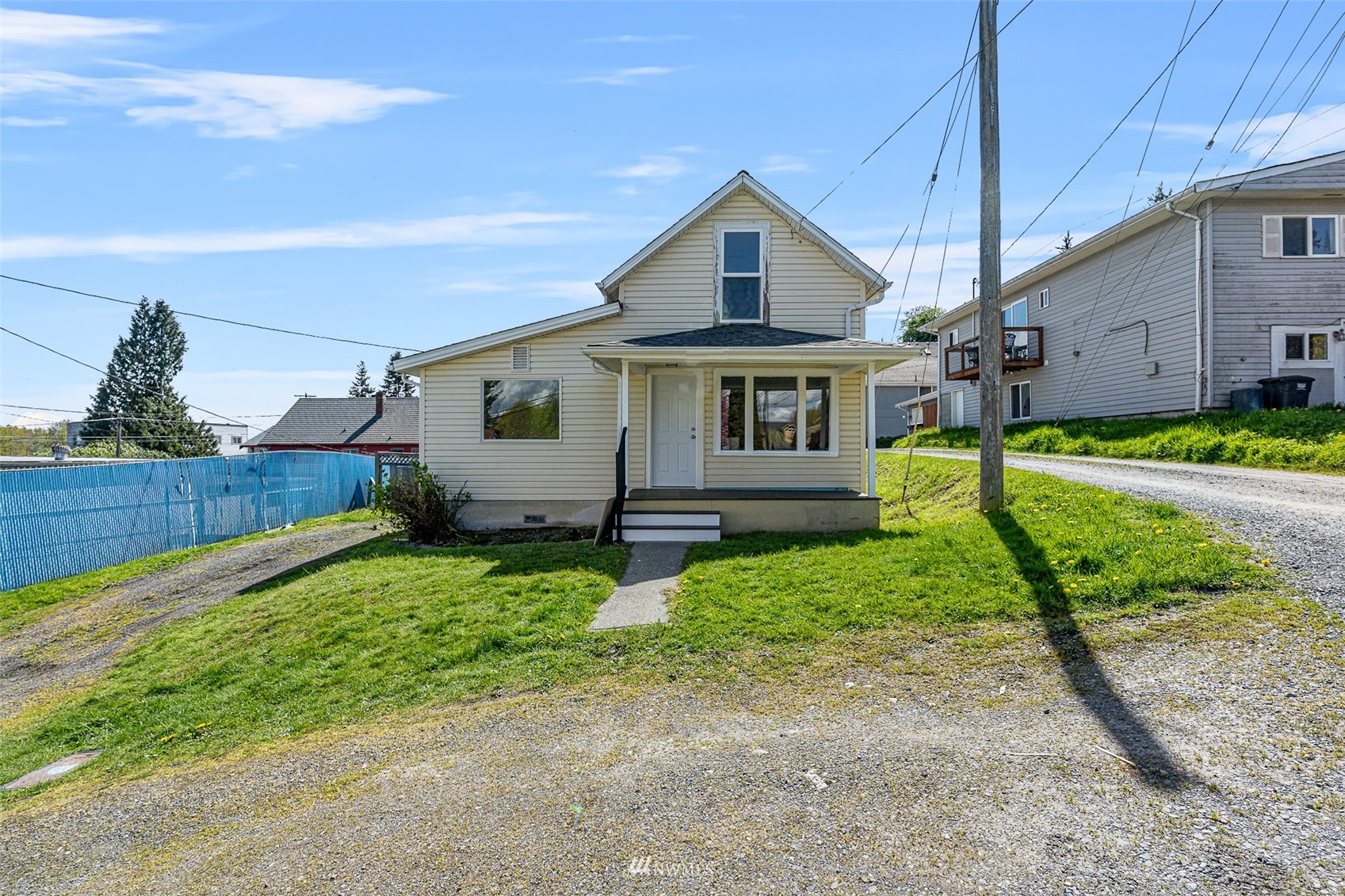 2228 Main Street Everett, WA 98203 - Photo 4 of 29 a front view of a house with garden
