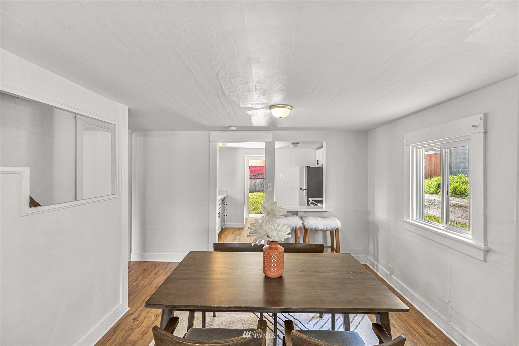 2228 Main Street Everett, WA 98203 - Photo 9 of 29 a view of a dining room with furniture and a window