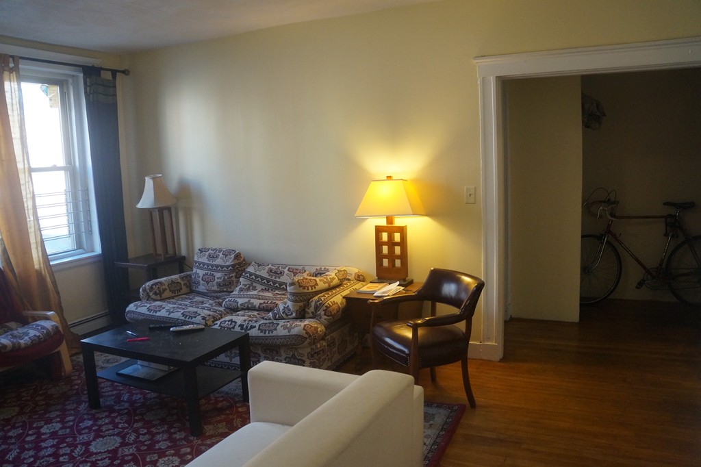 28 Ransom Road, Unit 4 Boston, MA 02135 - Photo 3 of 9 a living room with furniture and wooden floor