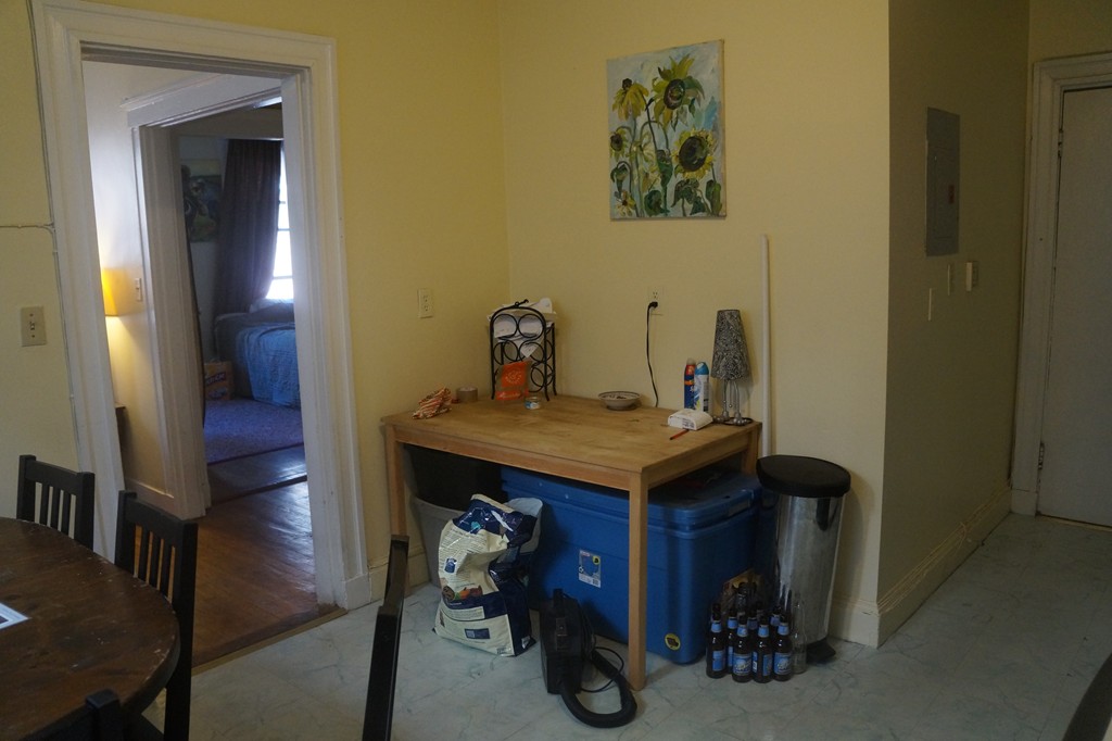 28 Ransom Road, Unit 4 Boston, MA 02135 - Photo 9 of 9 a view of a room that has a table and chairs in it