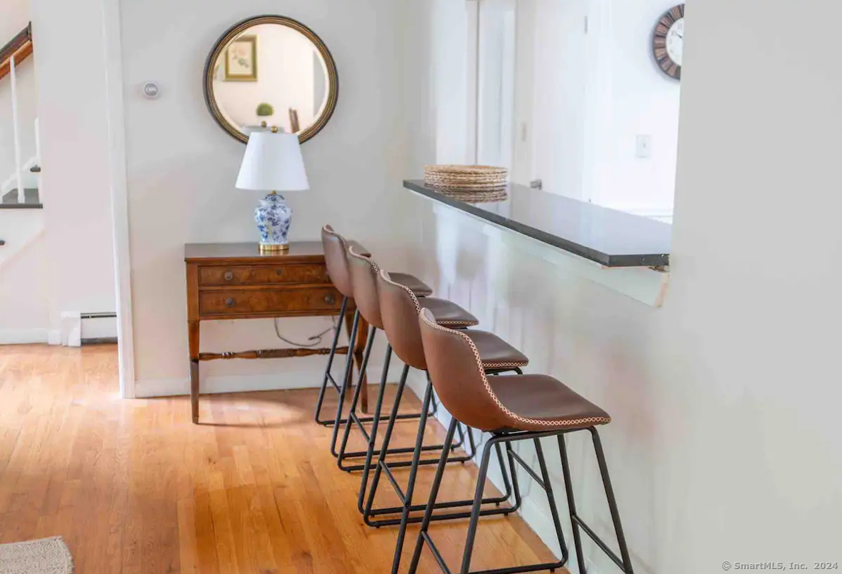 5 Hollow Spring Road Norwalk, CT 06854 - Photo 2 of 30 a view of a room with furniture and wooden floor