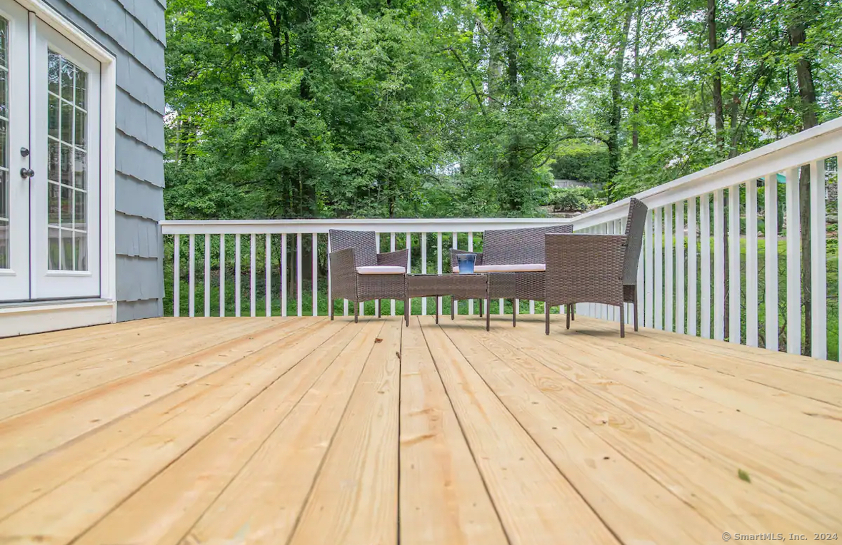 5 Hollow Spring Road Norwalk, CT 06854 - Photo 21 of 30 a view of a wooden deck