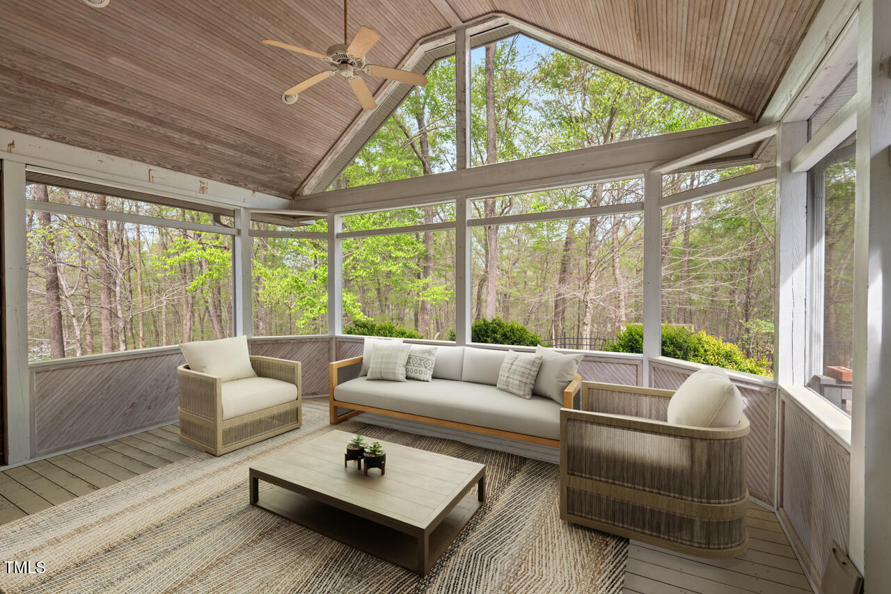 5900 Orchid Valley Road Raleigh, NC 27613 - Photo 23 of 52 a living room with furniture and a large window