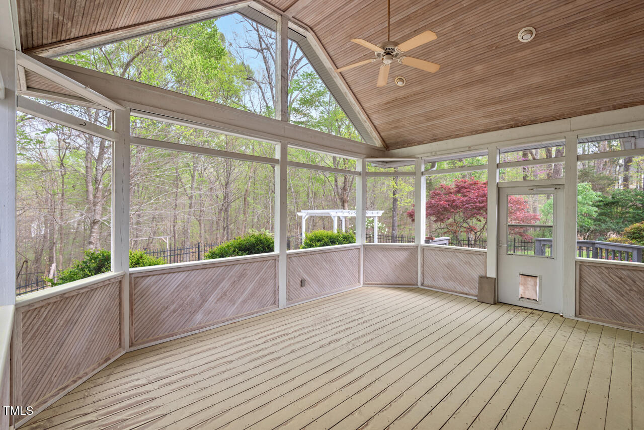 5900 Orchid Valley Road Raleigh, NC 27613 - Photo 25 of 52 a view of an empty room with a large window
