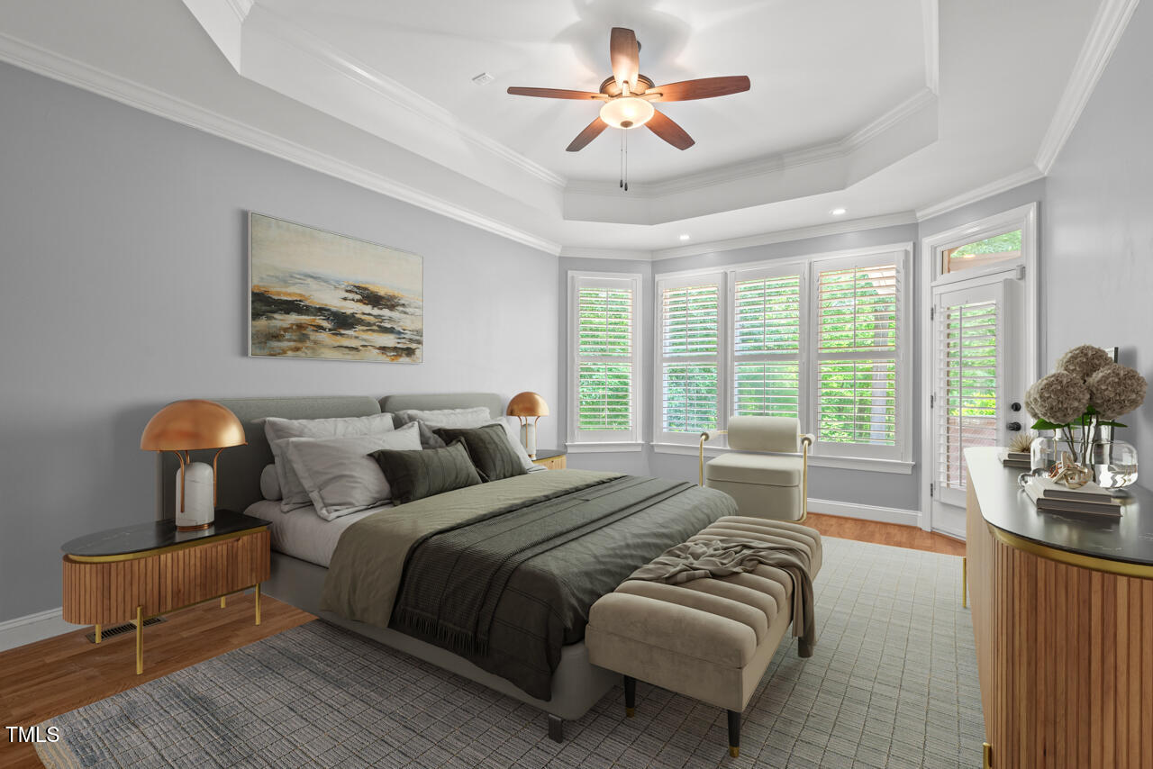 5900 Orchid Valley Road Raleigh, NC 27613 - Photo 26 of 52 a bed room with a bed and a couch