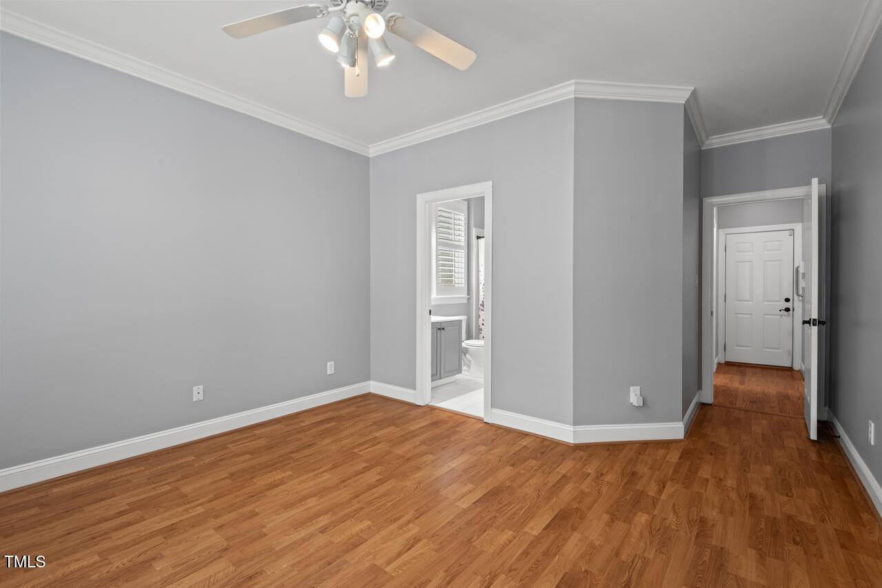 5900 Orchid Valley Road Raleigh, NC 27613 - Photo 36 of 52 a view of livingroom with hardwood floor and ceiling fan