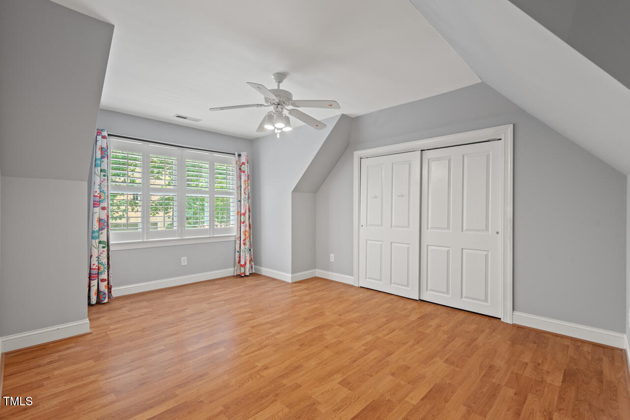 5900 Orchid Valley Road Raleigh, NC 27613 - Photo 43 of 52 a view of an empty room with a window