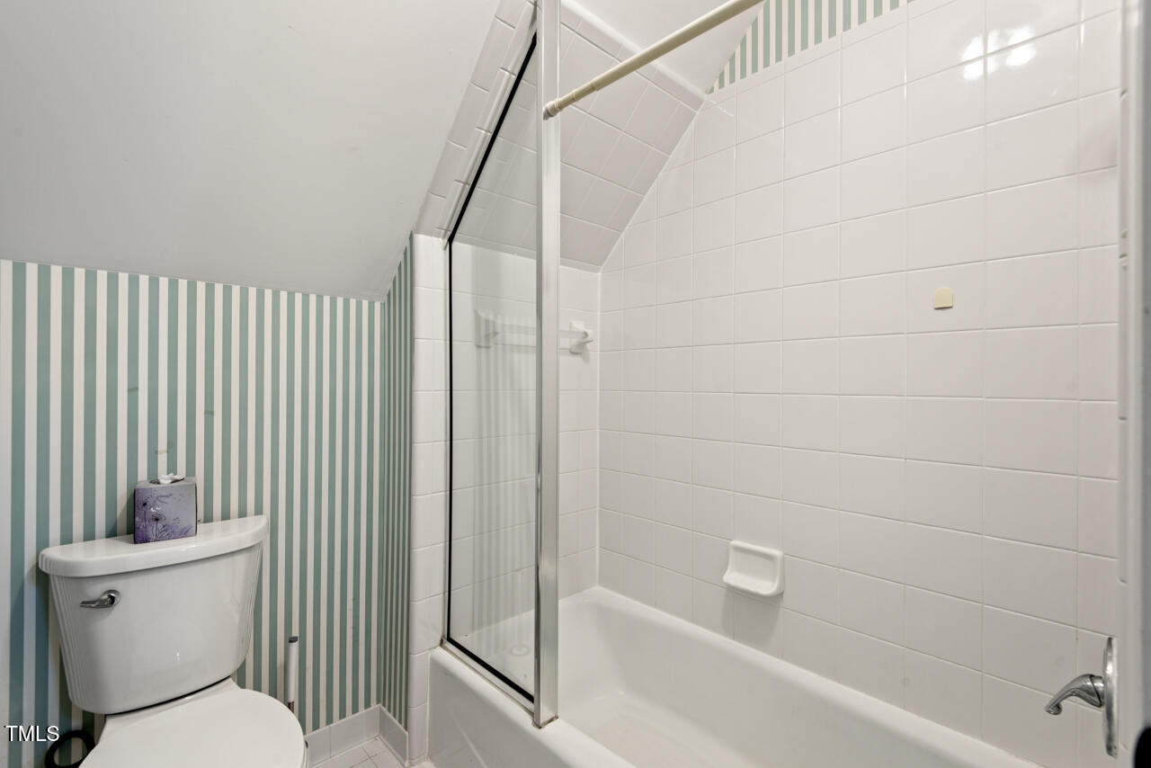 5900 Orchid Valley Road Raleigh, NC 27613 - Photo 44 of 52 a bathroom with a toilet and shower