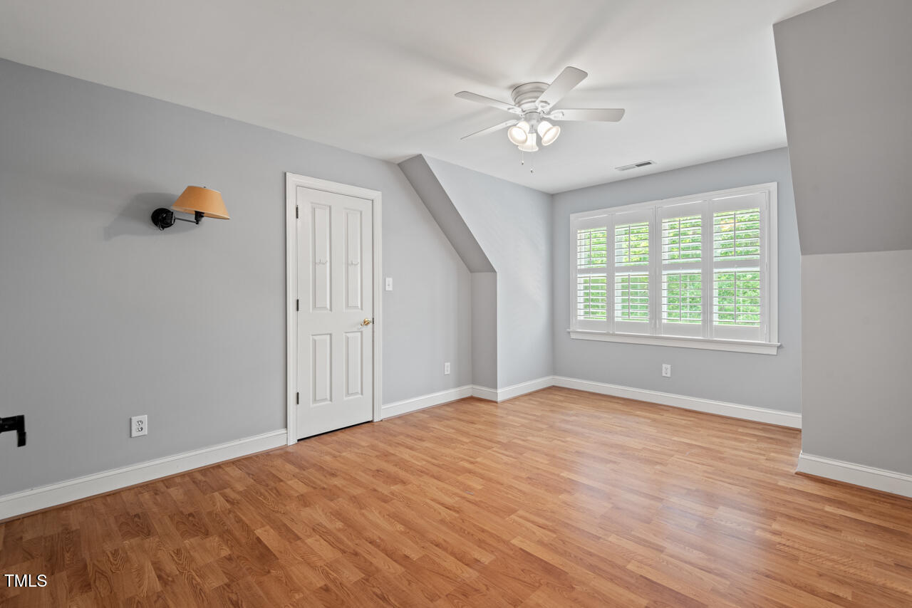 5900 Orchid Valley Road Raleigh, NC 27613 - Photo 45 of 52 a view of an empty room with a window