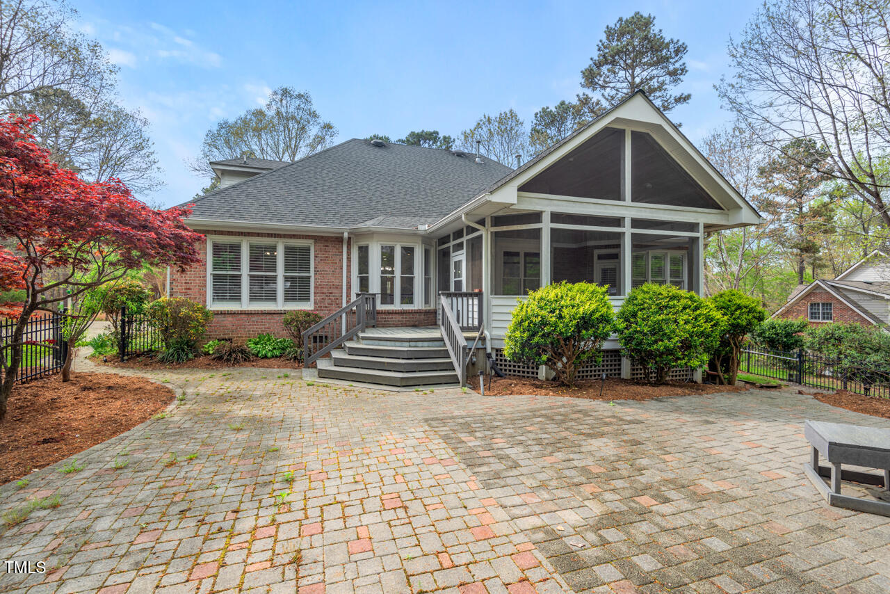 5900 Orchid Valley Road Raleigh, NC 27613 - Photo 48 of 52 a front view of a house with garden