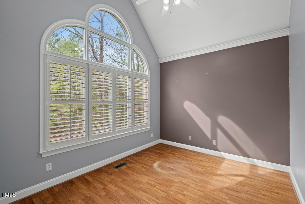 5900 Orchid Valley Road Raleigh, NC 27613 - Photo 10 of 52 a view of an empty room with a window