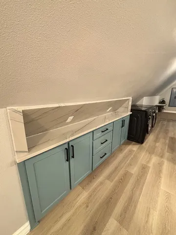 a view of storage and utility room