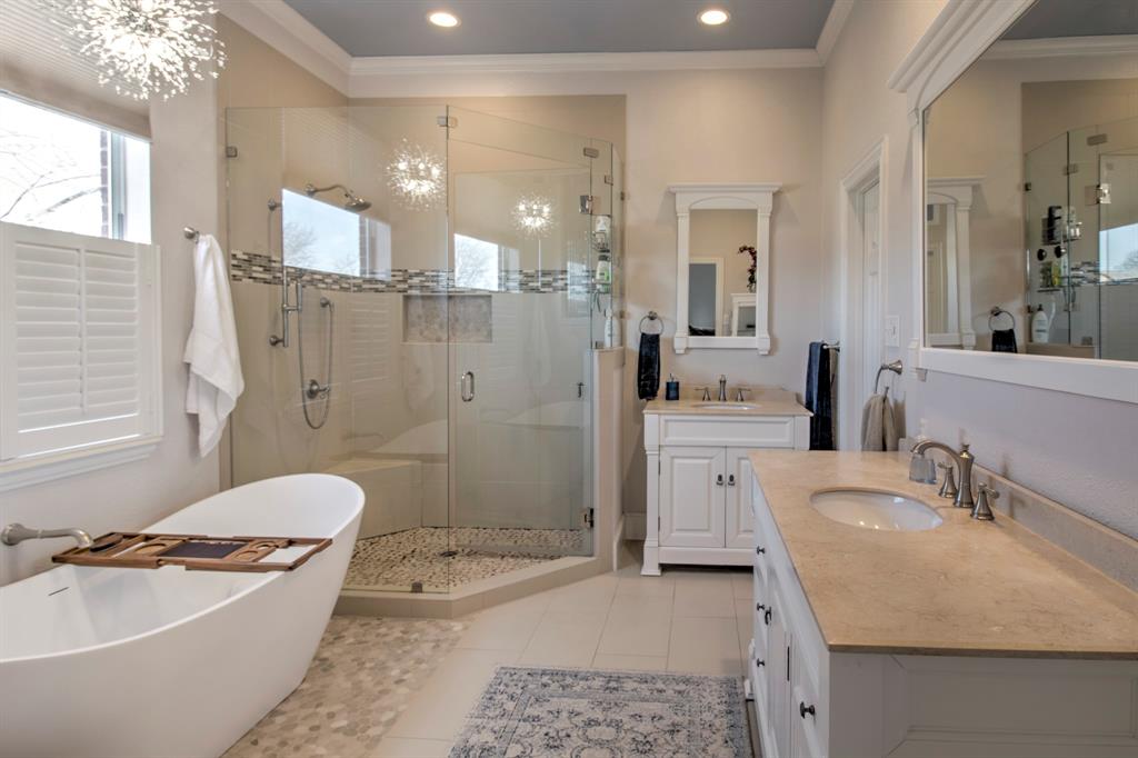 4275 Old Thomas Road Aubrey, TX 76227 - Photo 17 of 31 Beautiful Primary Bathroom, with separate free standing bathtub, and two separate vanity's.