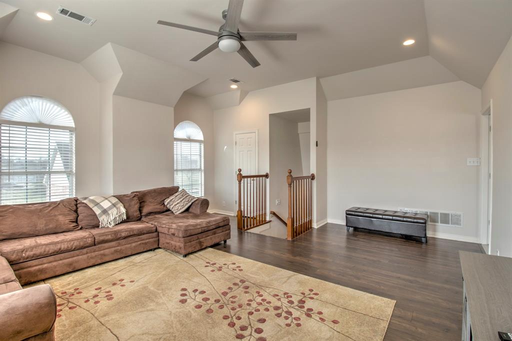 4275 Old Thomas Road Aubrey, TX 76227 - Photo 24 of 31 Make this space your own, possibilities are endless, with view of the second set of stairs in the home.