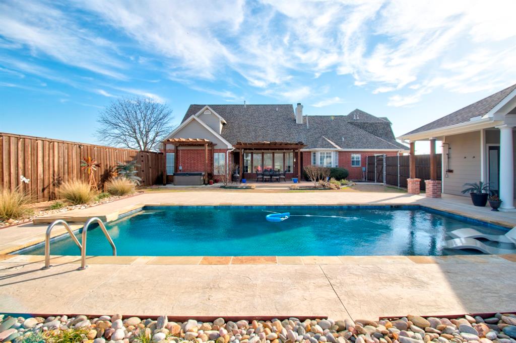 4275 Old Thomas Road Aubrey, TX 76227 - Photo 28 of 31 Enjoy Hot Summer days by the pool, with diving stone for fun in the sub, and relaxing evenings in the Hot Tub!