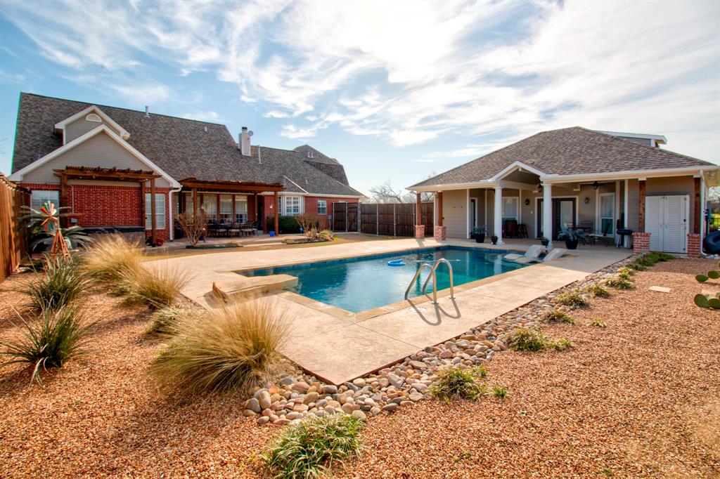 4275 Old Thomas Road Aubrey, TX 76227 - Photo 30 of 32 Escape to your very own backyard Oasis, with pool, pool house and hot tub!