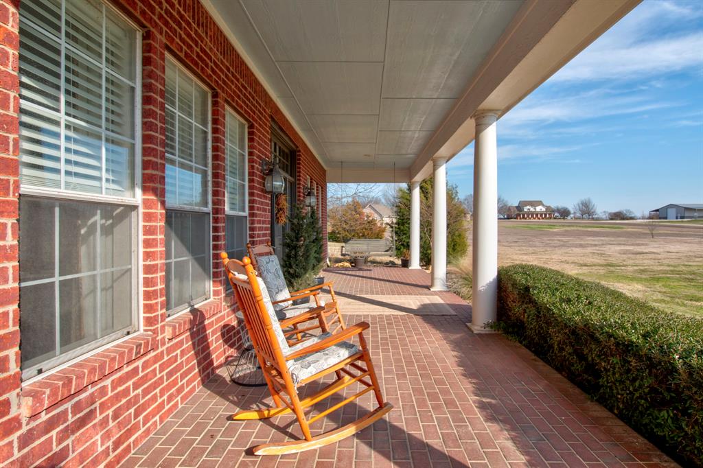 4275 Old Thomas Road Aubrey, TX 76227 - Photo 3 of 31 Enjoy Mornings on the front Patio