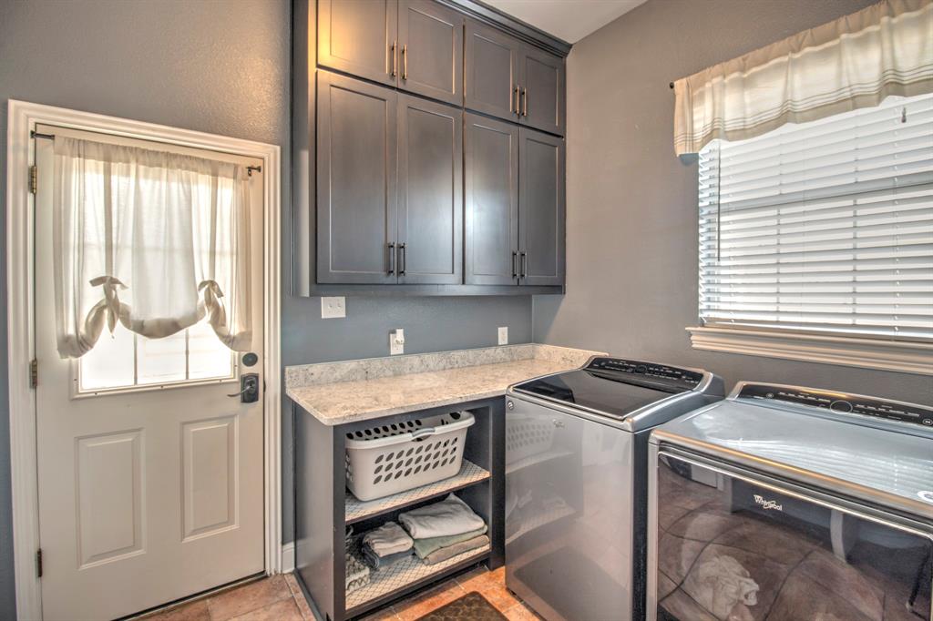 4275 Old Thomas Road Aubrey, TX 76227 - Photo 5 of 31 Great size laundry room with, with beautiful cabinetry for all your laundry essentials!
