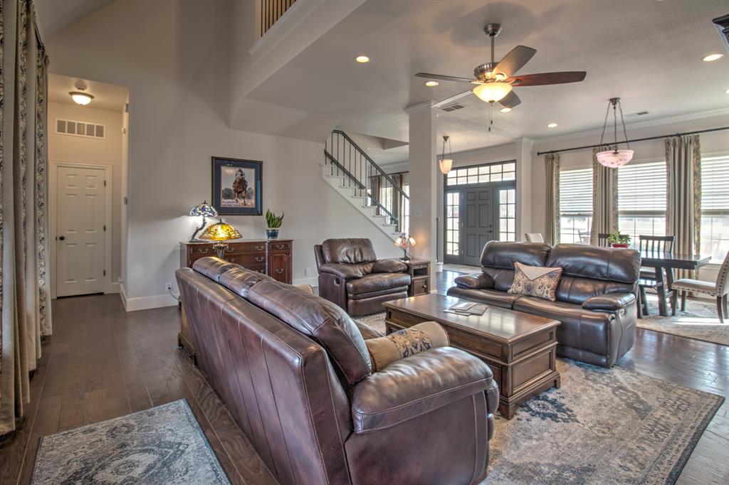 4275 Old Thomas Road Aubrey, TX 76227 - Photo 6 of 31 Living room perfect for relaxing or entertaining.