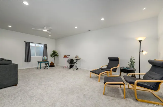 a view of a livingroom with furniture and a couch
