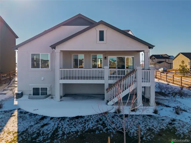 a view of house with a yard