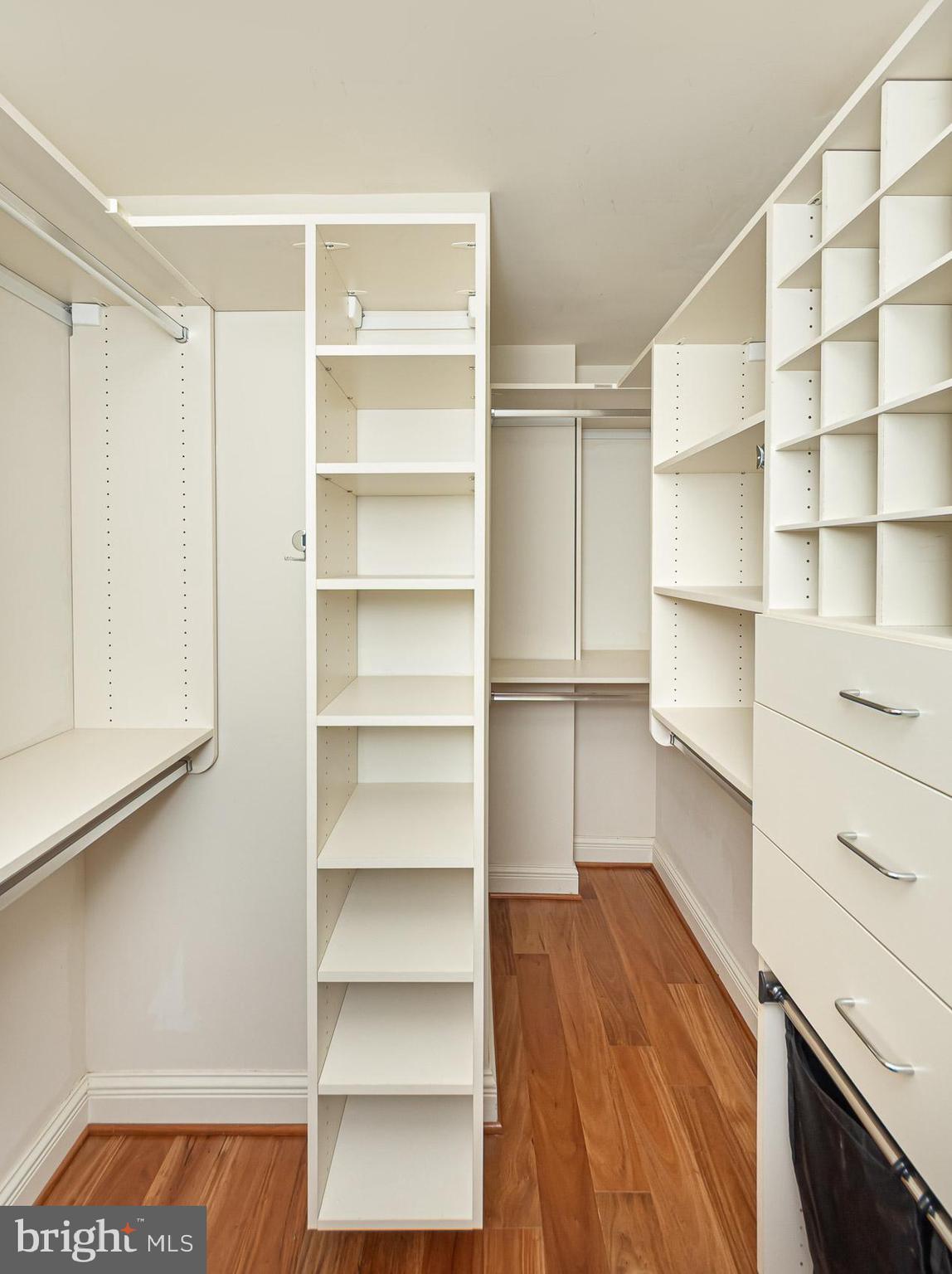 801 Key Highway, Unit 153 Baltimore, MD 21230 - Photo 21 of 40 a view of walk in closet with empty racks