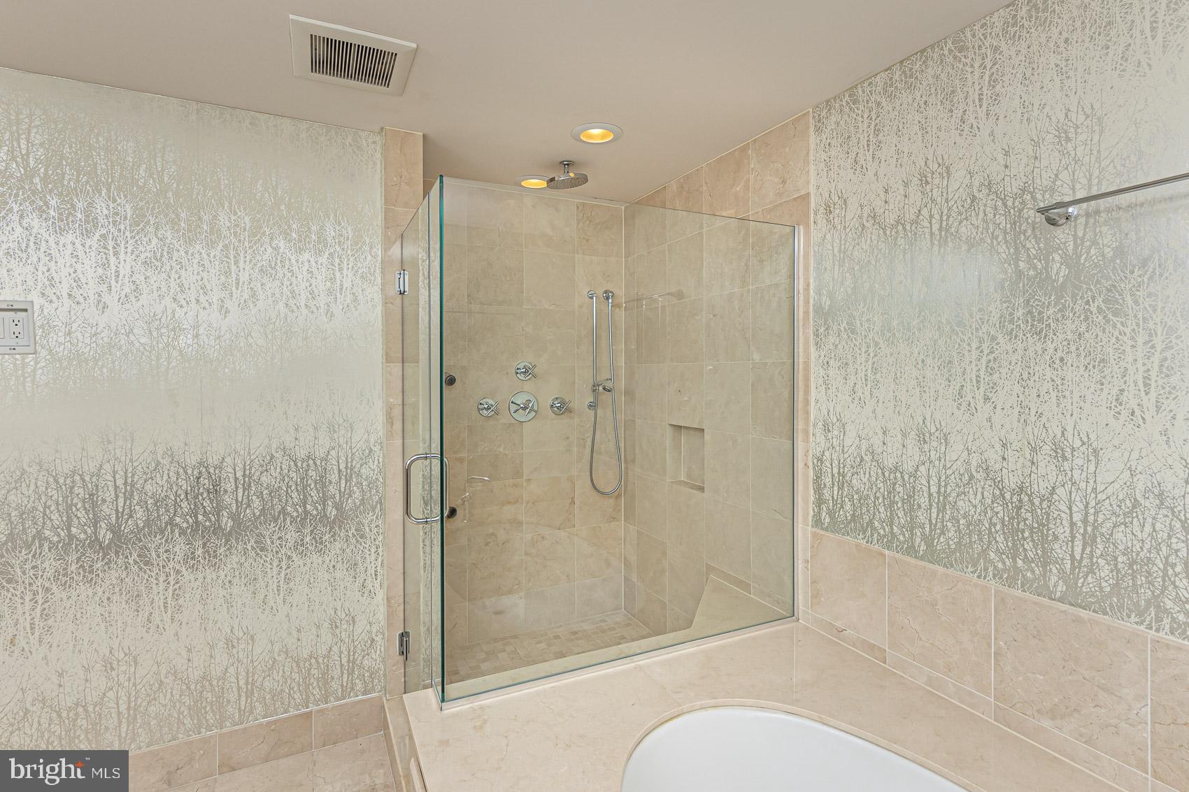 801 Key Highway, Unit 153 Baltimore, MD 21230 - Photo 24 of 40 a bathroom with a shower and toilet