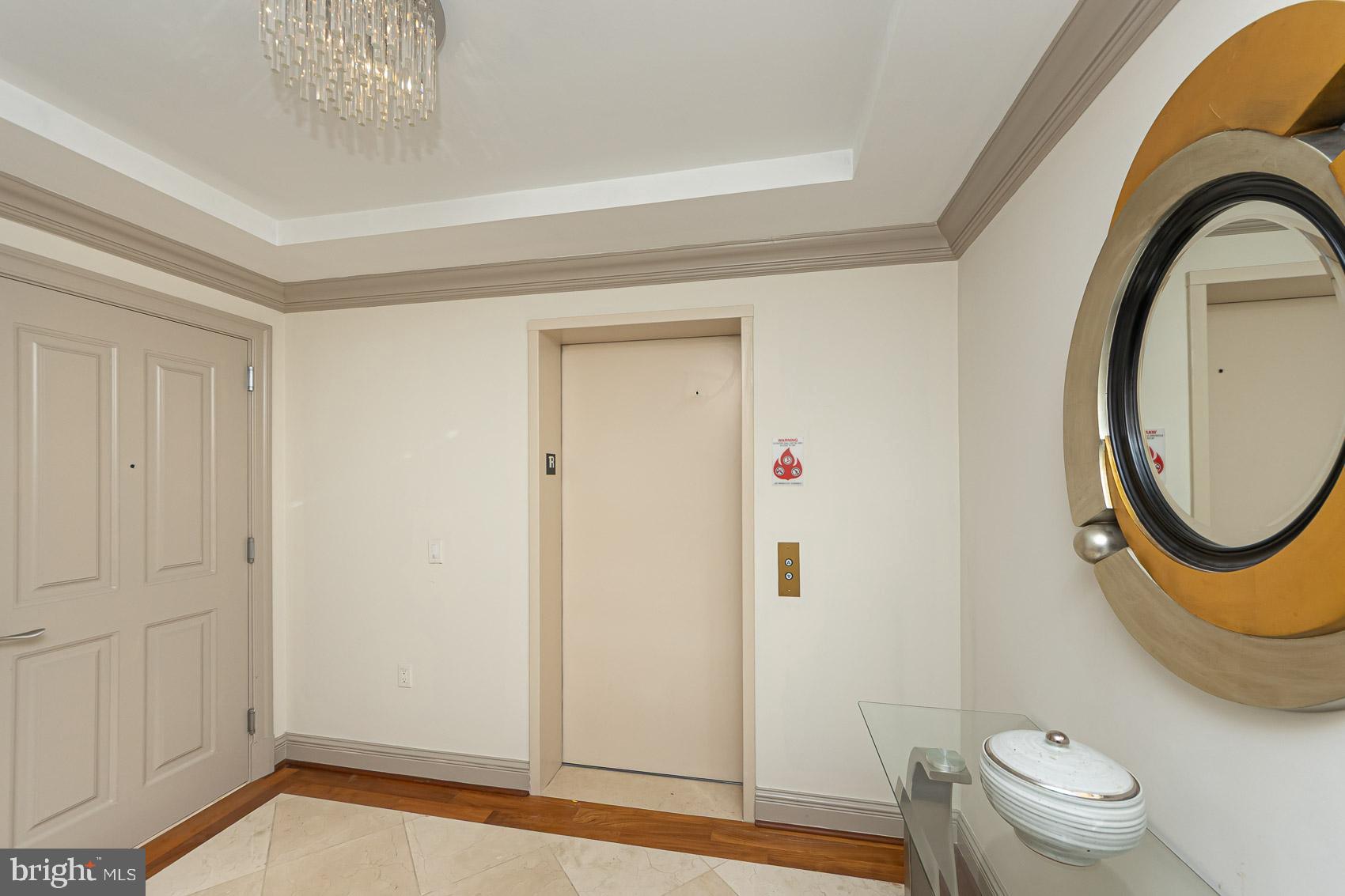 801 Key Highway, Unit 153 Baltimore, MD 21230 - Photo 30 of 40 a bathroom with a sink a toilet and a shower