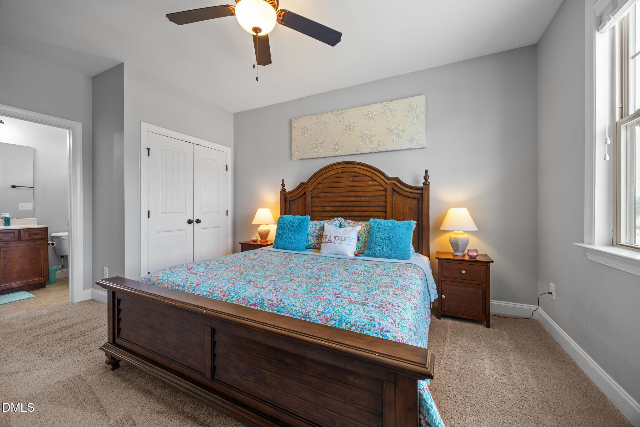 4603 Brighton Ridge Drive Apex, NC 27539 - Photo 34 of 69 a bedroom with a bed and window