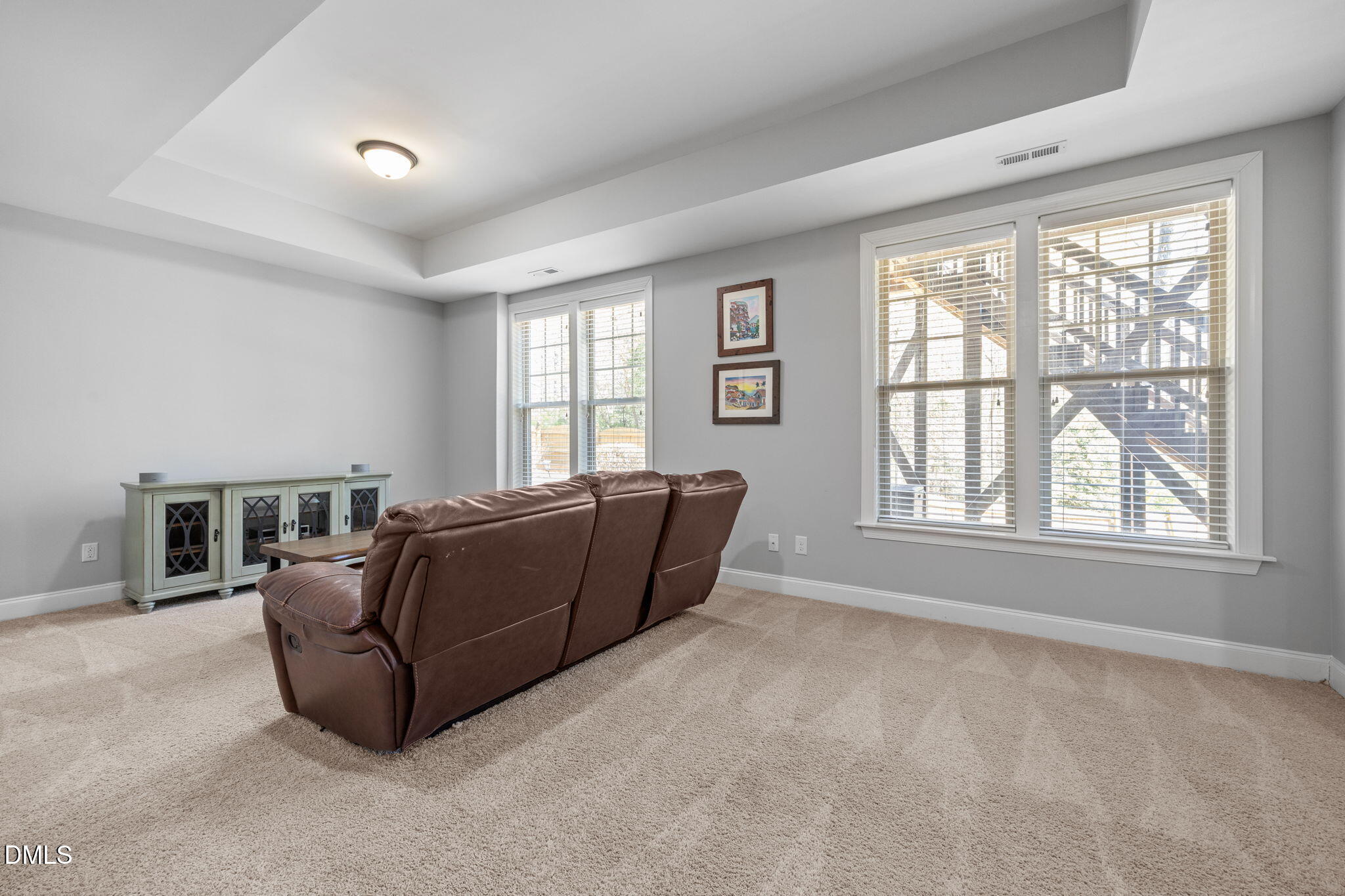4603 Brighton Ridge Drive Apex, NC 27539 - Photo 41 of 69 a living room with furniture and windows