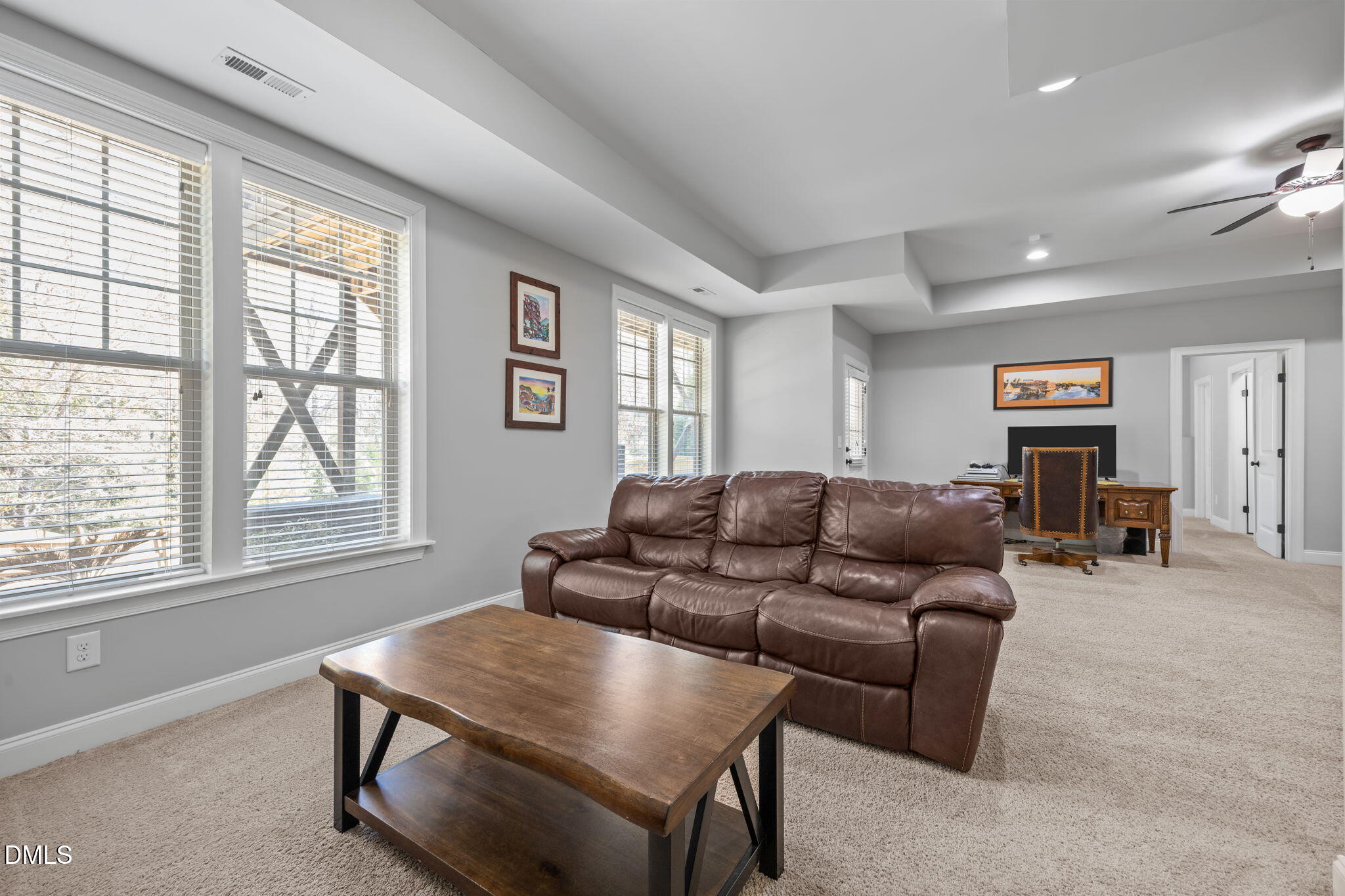 4603 Brighton Ridge Drive Apex, NC 27539 - Photo 42 of 69 a living room with furniture and a window