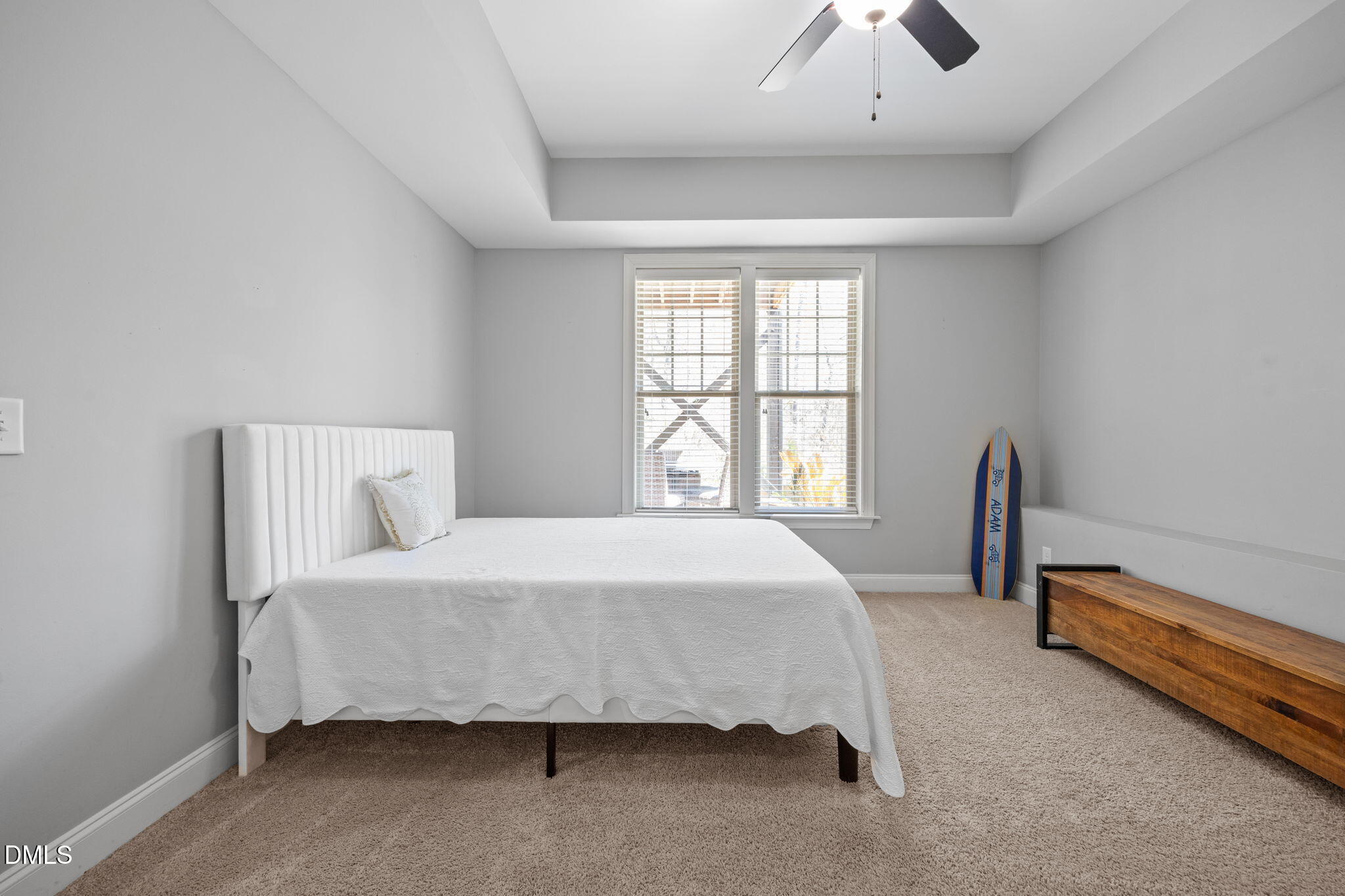 4603 Brighton Ridge Drive Apex, NC 27539 - Photo 43 of 69 a bedroom with a bed chair and a large window