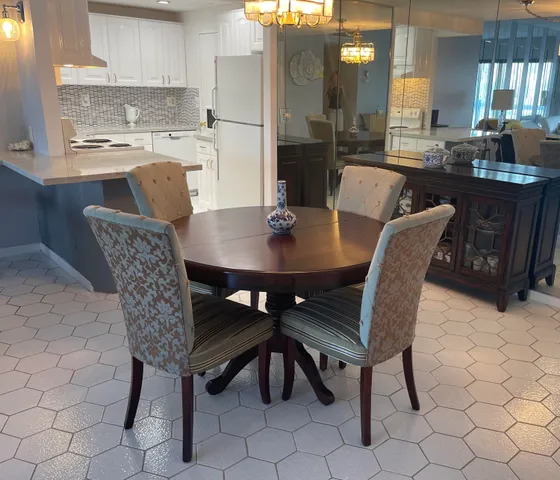 a view of a dining room with furniture