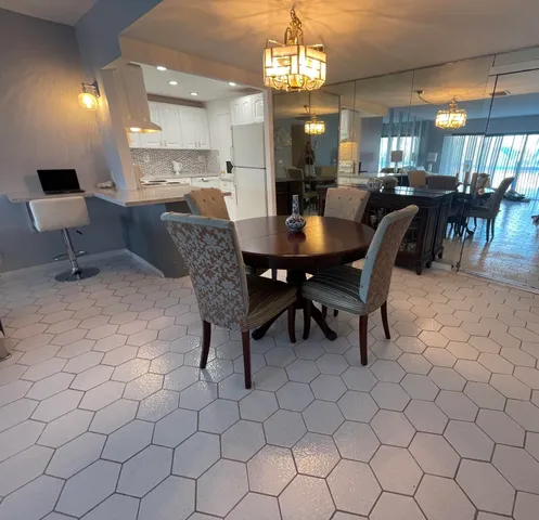 a view of a dining room with furniture