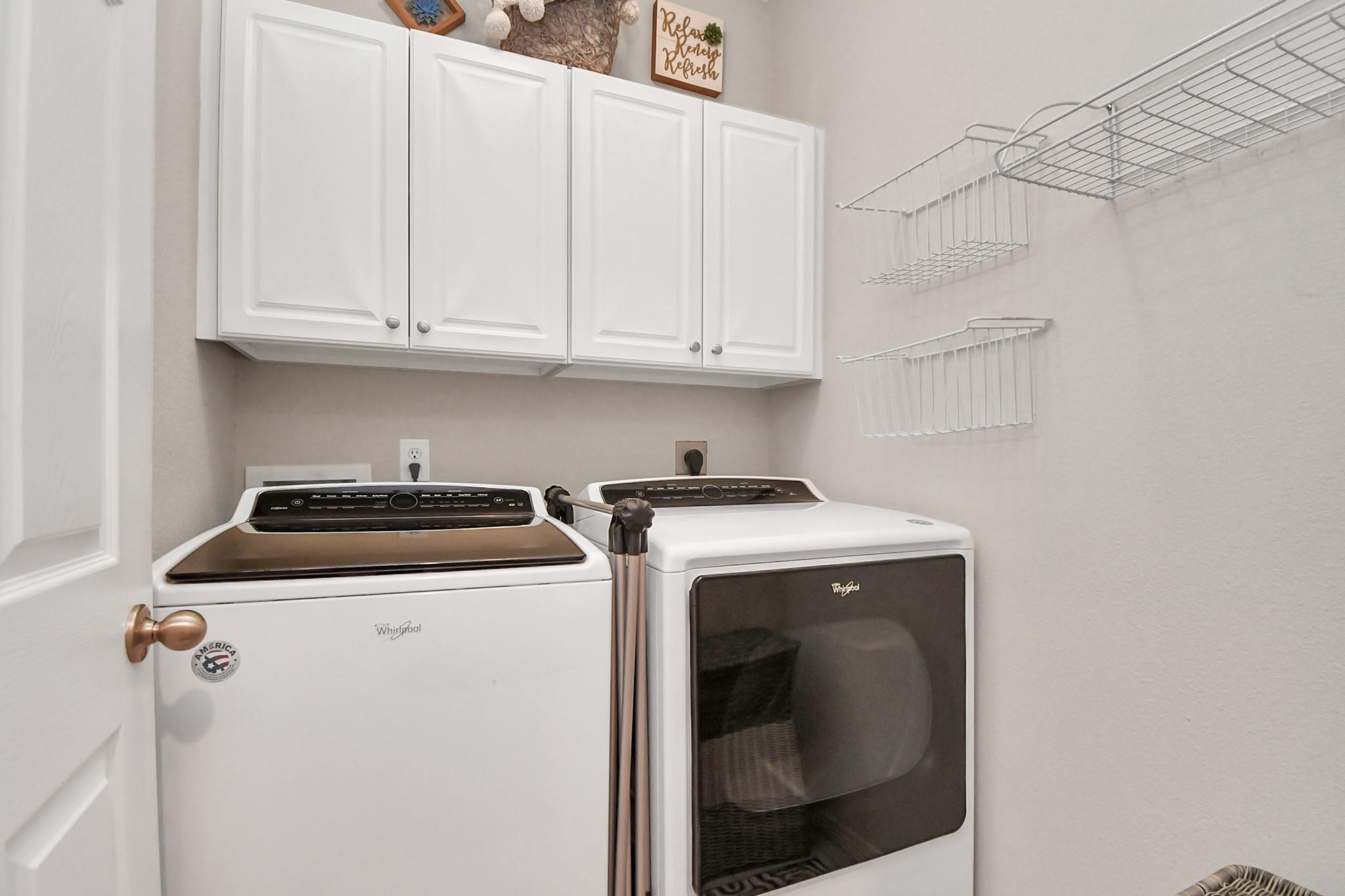 8624 Sunset Loch Drive Spring, TX 77379 - Photo 32 of 44 a utility room with dryer and washer
