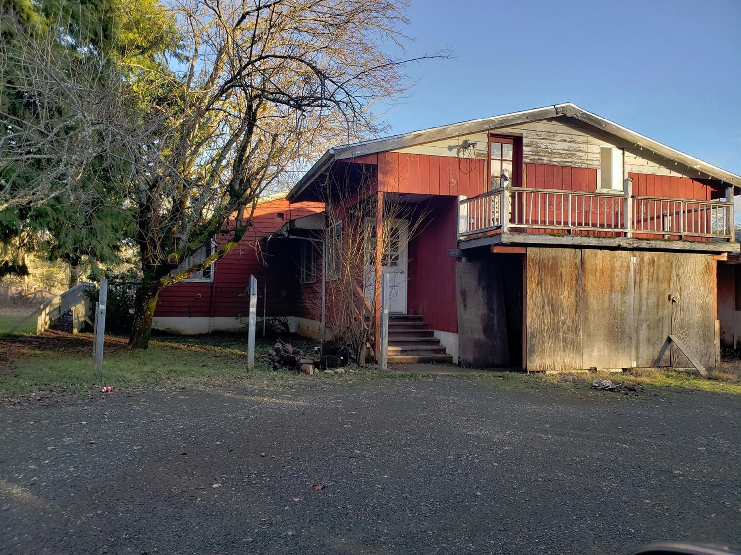 239 Dick George Road Cave Junction, OR 97523 - Photo 7 of 19 a front view of a house with a yard