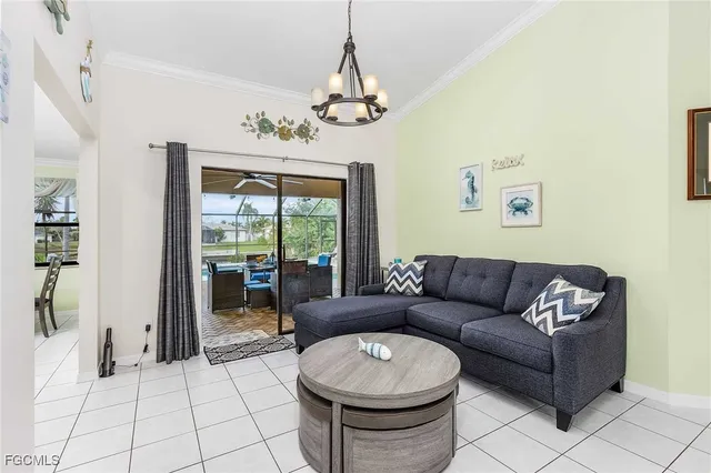 a kitchen with stainless steel appliances granite countertop a stove top oven a sink dishwasher and cabinets with wooden floor