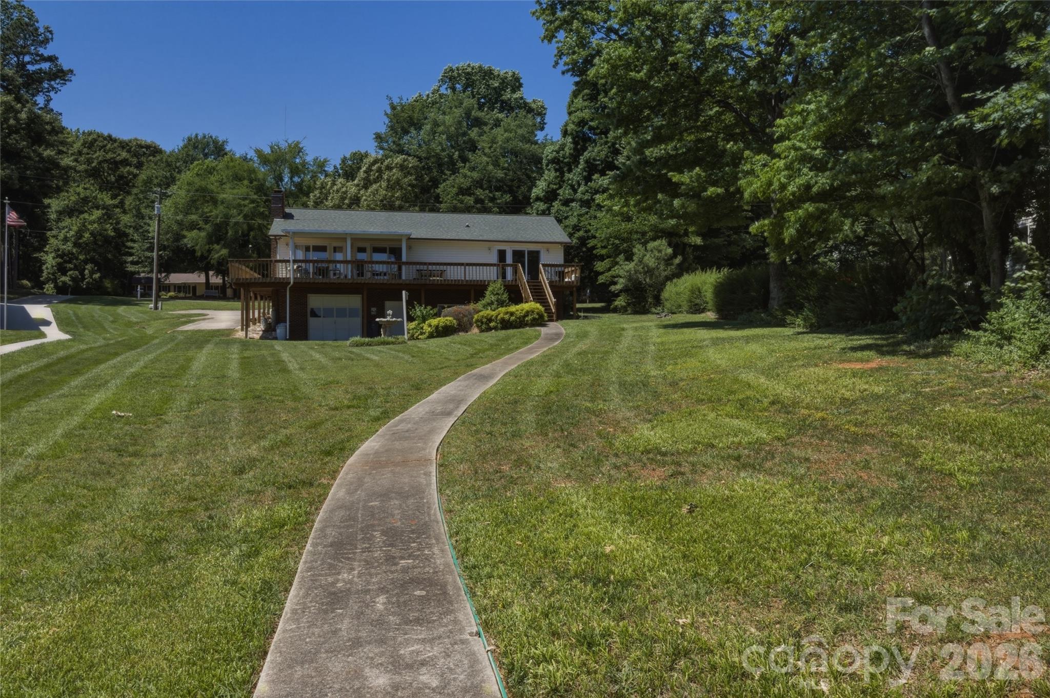 8226 Normandy Road Denver, NC 28037 - Photo 7 of 29 a view of a house with a yard