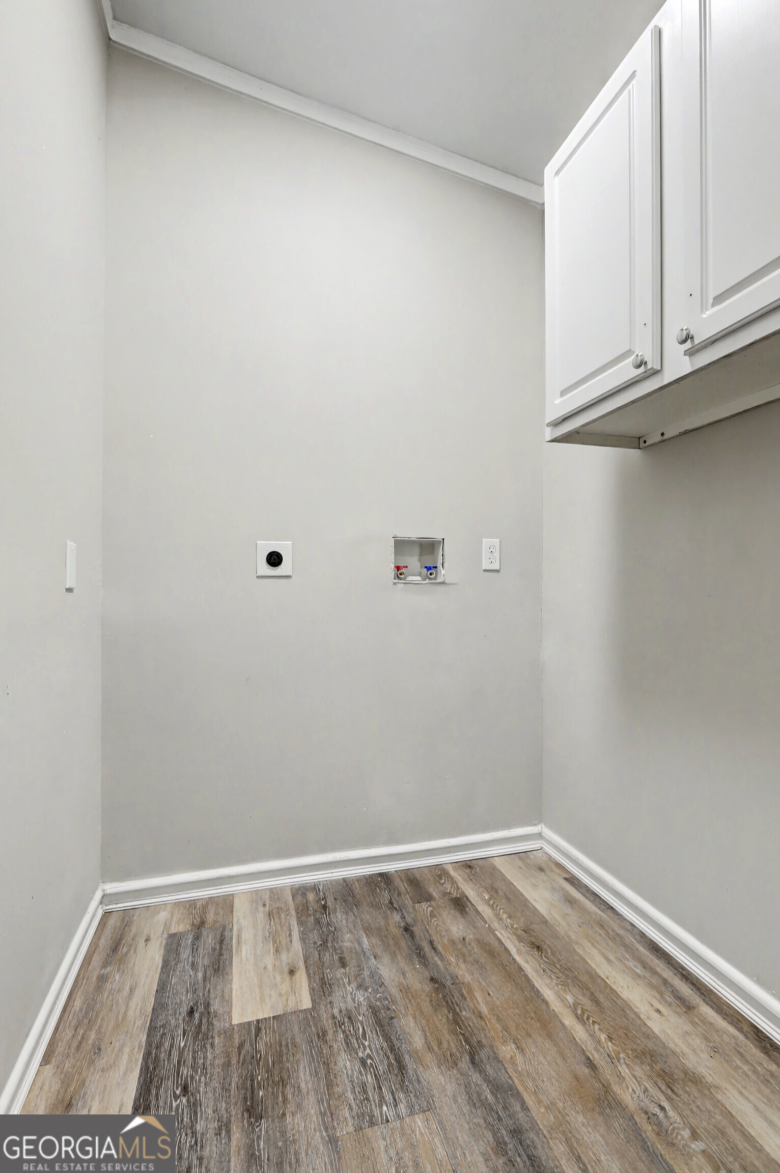 194 McKneely Road Milner, GA 30257 - Photo 27 of 30 a view of small space with racks on the wall