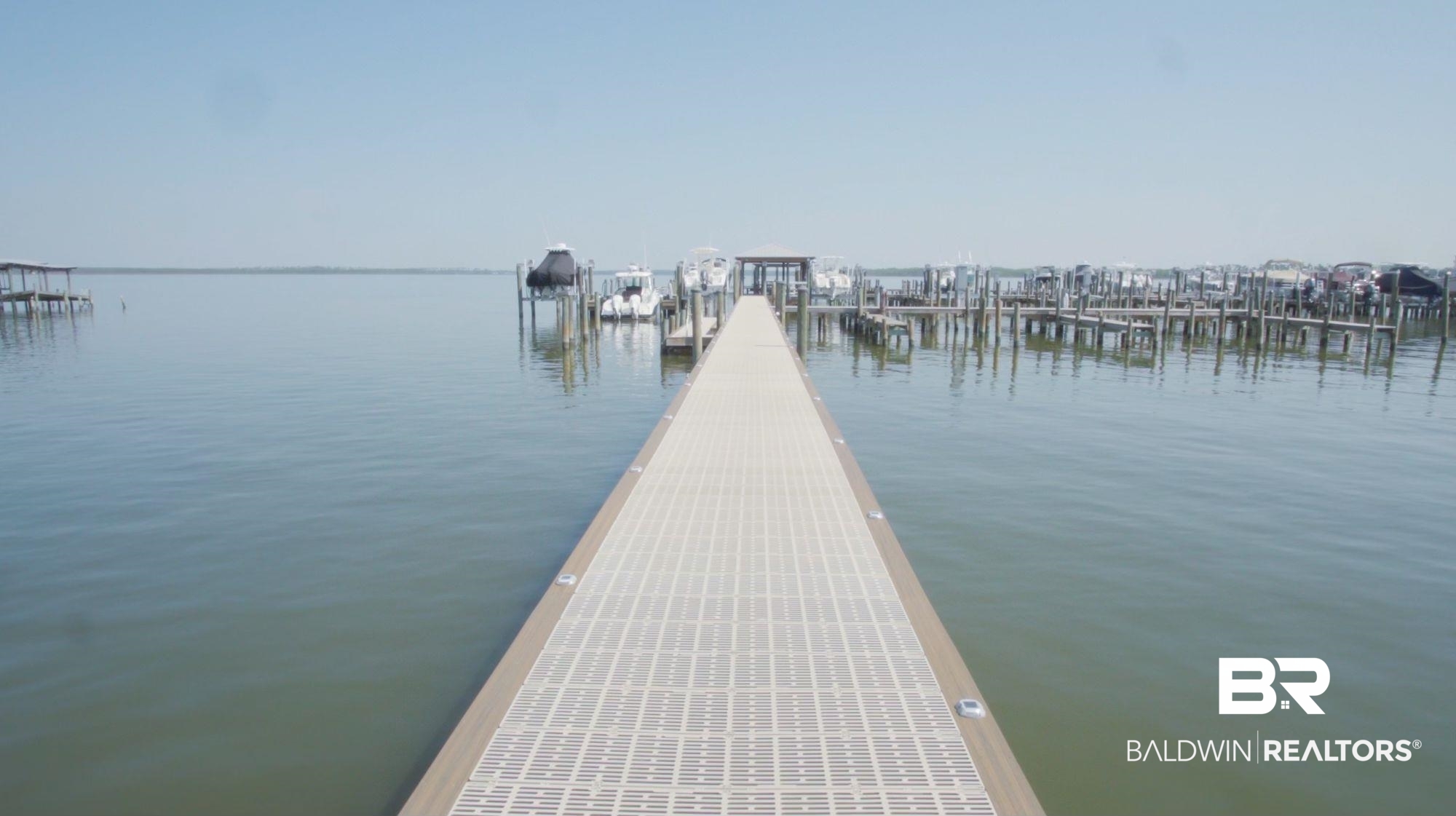 25861 Canal Road, Unit 75 Orange Beach, AL 36561 - Photo 38 of 40 View of dock with a water view