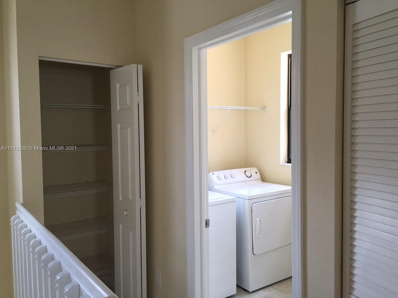 8630 West 33rd Avenue Hialeah, FL 33018 - Photo 12 of 22 a utility room with dryer and washer